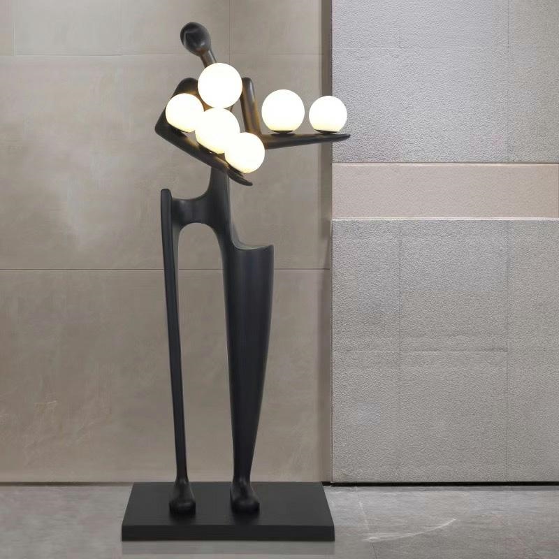 czarne lampy podłogowe stojące human